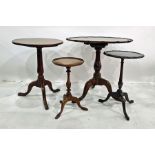 Mahogany snap-top table on tripod base, an oak circular snap-top table and two wine tables (4)