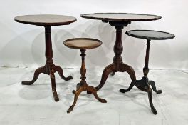 Mahogany snap-top table on tripod base, an oak circular snap-top table and two wine tables (4)