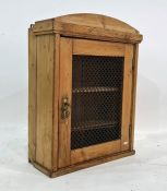 Late 19th century pine wall-hanging food cupboard with grilled single cupboard door Condition