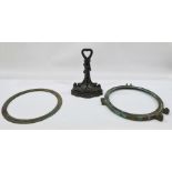 A bronze porthole and a 19th century Coalbrookdale style doorstop