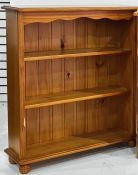 Pair of 20th century pine open bookcases, each 83.5cm x 100cm (2)