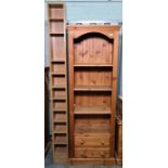 20th century narrow pine bookcase with two drawers under, a bedside chest of three drawers and an