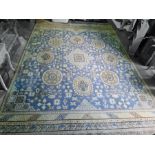 Large Chinese blue ground rug, the central medallion surrounded by further medallions, the sky