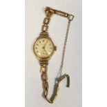 9ct gold lady's wristwatch with 9ct gold bracelet strap