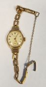 9ct gold lady's wristwatch with 9ct gold bracelet strap