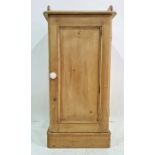 Late 19th century pine pot cupboard with three-quarter galleried top above moulded edge, single door