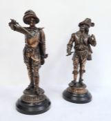 Pair of 19th century French bronzed-finish spelter figures of cavaliers, each in feathered hat and