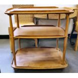 Ercol light elm three-tier tea trolley, 21cm x 77cm