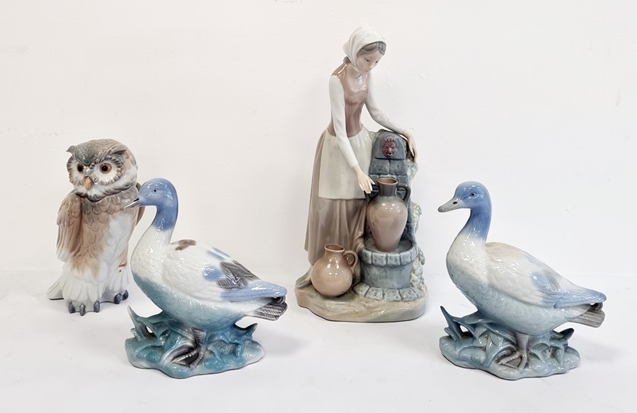 Nao porcelain figure of girl at well, a Nao model owl and two model ducks (4)