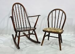 Dark elm seated Ercol stickback rocking chair and one further chair (2)