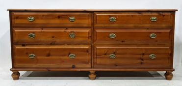 20th century pine chest of six short drawers raised on turned feet, 164cm x 70cm