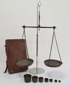 Set of scales and brass weights in leather suitcase
