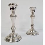Pair of silver weighted table candlesticks (2)