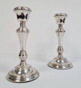 Pair of silver weighted table candlesticks (2)