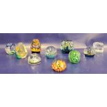 Collection of Caithness paperweights and other examples, including a Caithness 'Sea Dance'