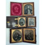 Family portrait photographic miniatures, some set in brown leather cases
