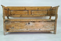 Possibly 19th century and later pine bench with panelled back and sides, with lift-top seat,