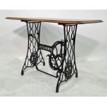 Mahogany-topped side table, the base from Singer sewing machine, 105cm x 76.5cm Condition