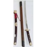 George III hand-painted wooden magistrates tip staff and a steel Wakizahi katana sword, the case