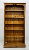 Modern pine open bookcase with fluted pilasters, raised on plinth base, 96cm x 195cm