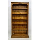 Modern pine open bookcase with fluted pilasters, raised on plinth base, 96cm x 195cm
