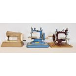 Child's Vulcan sewing machine in blue, another in red and a child's Singer sewing machine (3)