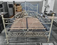 20th century 5ft bed frame with cream painted tubular metal head and footboard with king-size
