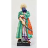 Royal Worcester figure of 'Bluebeard', modelled by Sybil Williams and Jessamine Bray, printed puce
