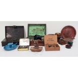 Set of dominoes, bakelite napkin rings, bakelite boxes, a brass candle holder, a tin spice box