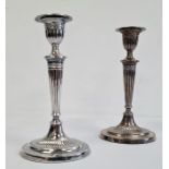 Pair of silver table candlesticks, weighted