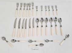 A quantity of stainless steel flatware, bottle opener, plated ware, pewter tankard and a