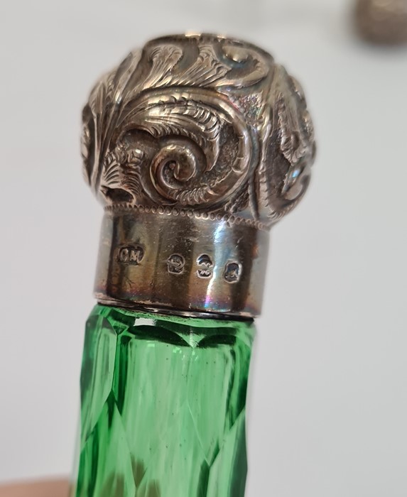 Pair of Victorian green cut glass hobnail perfume bottles with silver embossed tops, a small example - Image 2 of 4