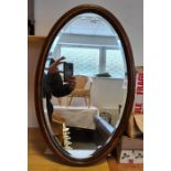 Oval oak-framed mirror  Condition ReportThe height is 66 cm X the width is 41 cm