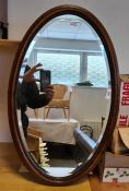 Oval oak-framed mirror  Condition ReportThe height is 66 cm X the width is 41 cm