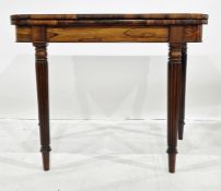 19th century rosewood card table, the rectangular top with curved front corners, opening to reveal