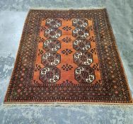 Brown ground Persian rug with 10 elephant foot guls, stepped border, 212 x 156cm