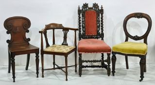 19th century mahogany hall chair with carved back, bearing armorial of hand, turned supports, peg