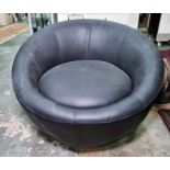 Black leather tub-type chair