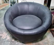 Black leather tub-type chair