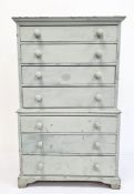 Duck egg blue painted wood miniature tallboy with seven drawers, on bracket feet, 59cm high