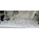 Large quantity of cut drinking and sundae glasses, two various cut glass decanters and other