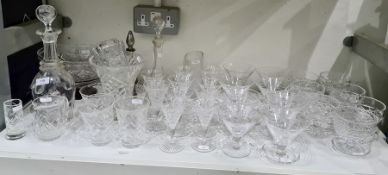 Large quantity of cut drinking and sundae glasses, two various cut glass decanters and other