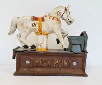 A painted cast iron 'Trick Pony' money box