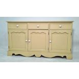 20th century painted pine sideboard with three drawers above three cupboard doors, bracket feet,