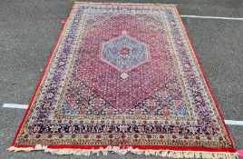 Persian rug with central medallion, foliate decorated field, stepped border, 300 x 203cm