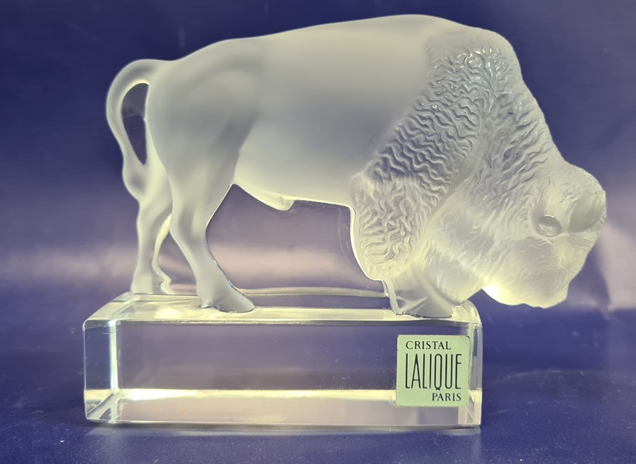 Lalique clear and satin glass buffalo-pattern paperweight, inscribed 'Lalique' to base, 9.5cm