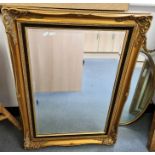 Rectangular gilt effect framed mirror and an oval mirror (2)