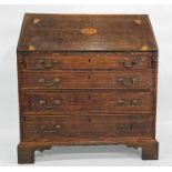 Oak bureau with decorative shell inlay to fall, four graduated long drawers, bracket feet, 96cm x