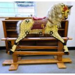 Rocking horse with painted carved wooden body, horse hair mane and tail on pine base