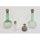 Pair of Victorian green cut glass hobnail perfume bottles with silver embossed tops, a small example